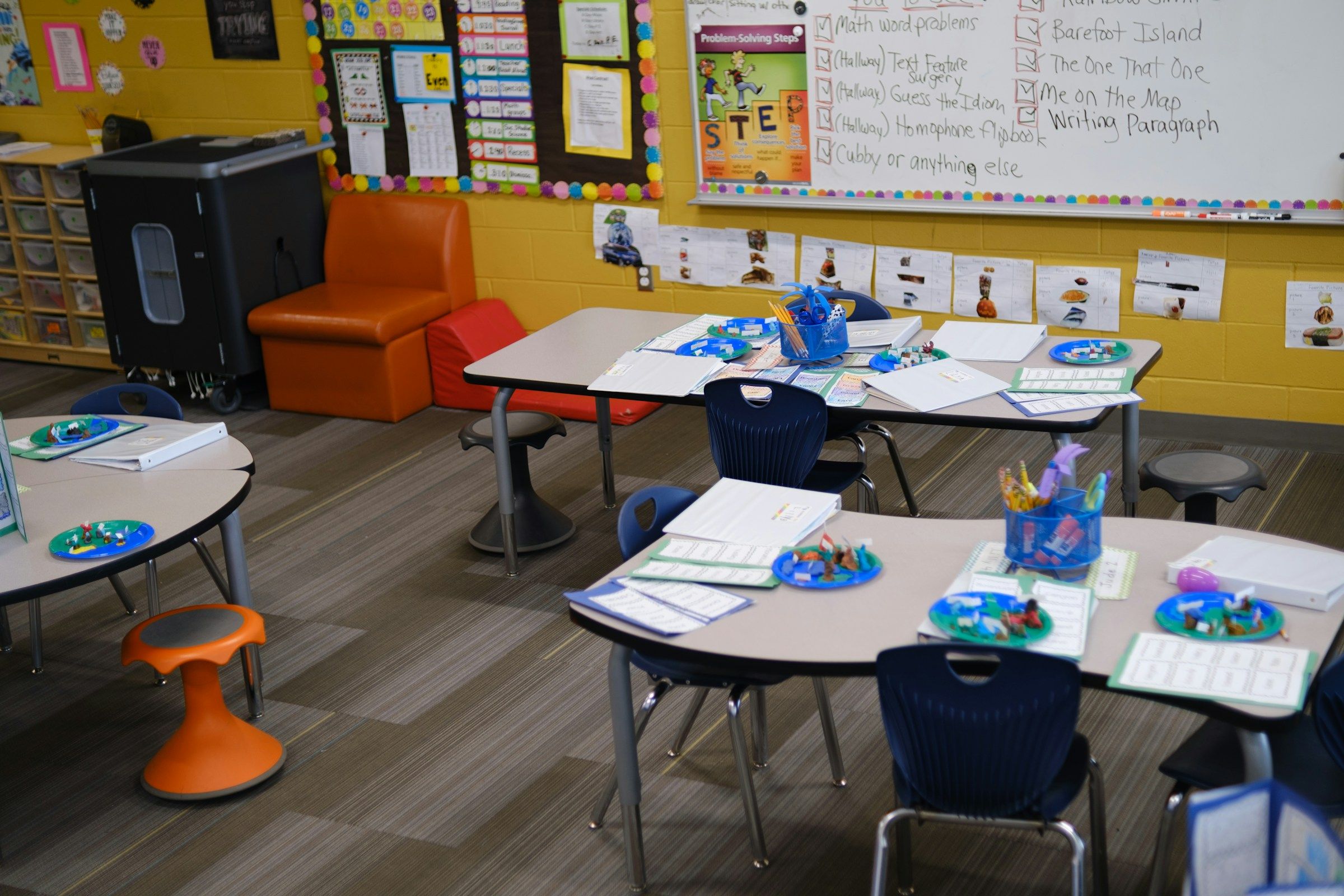 Low craft tables and small chairs in an empty classroom